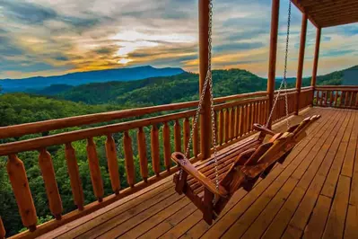 porch swing at cabin with mountain view