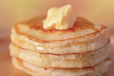 stack of pancakes with butter