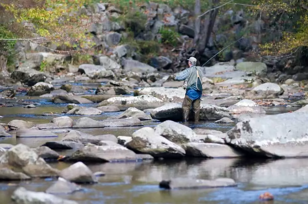 man fishing in the smoky mountains