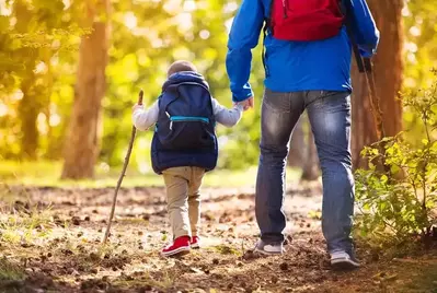 father and son hiking in the smoky mountains