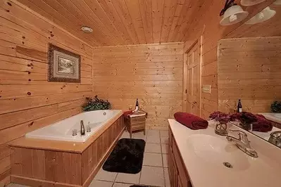 The bathroom in the Hawk's View cabin in Gatlinburg with a Jacuzzi tub. 