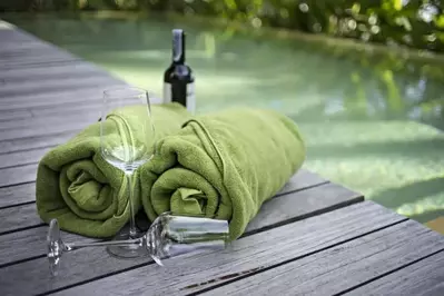 towel and wine glass in a large Pigeon Forge cabin rental with indoor pool