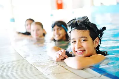 kids staying in a Pigeon Forge cabin with indoor pool