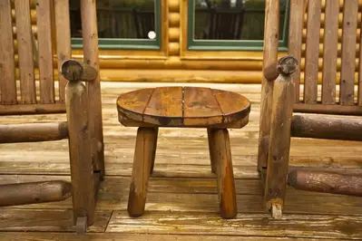 Chairs on the porch of a cabin