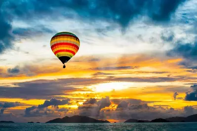 Hot air balloon in the sky at sunset