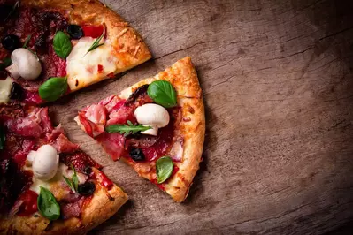 Pizza on wooden table